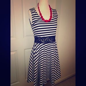 Stretchy sleeveless, mid thigh dress